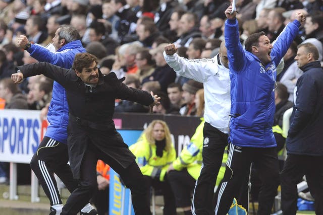 Andre Villas-Boas celebrates a Chelsea goal with his coaches,
not his players