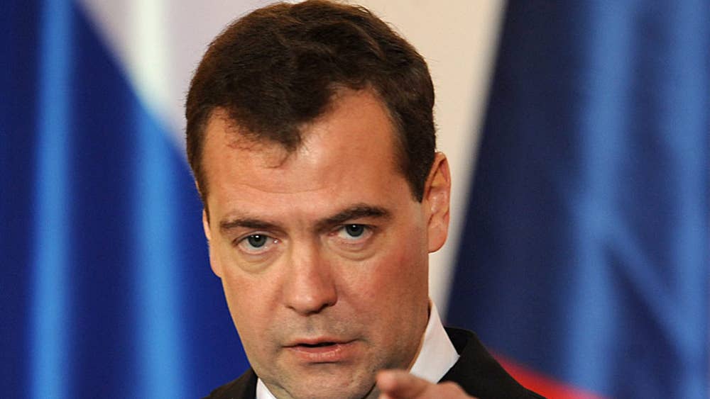 Medvedev S Call To Probe Vote Rigging Ridiculed By Protesters
