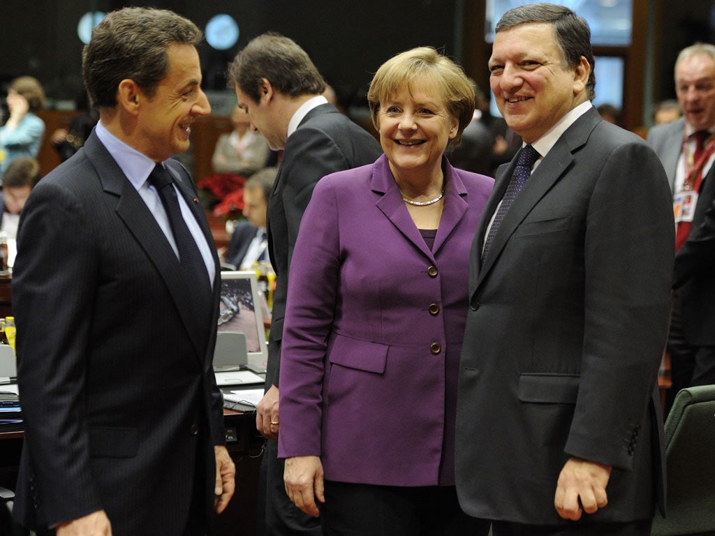 Nicolas Sarkozy, Angela Merkel and the EC president, Jose Manuel Barroso, in Brussels