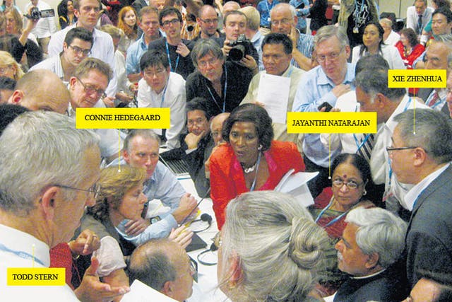 The deal was done at the International convention Centre on Sunday. The key players are Todd Stern, US Climate Envoy (front left, looking on), Connie Hedegaard, EU Climate Commissioner (seated at left, right hand raised), Jayanthi Natarajan, Indian Enviro