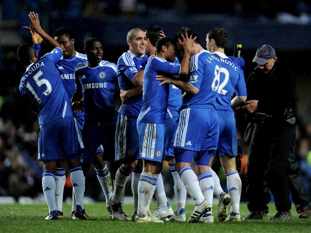 Ashley Cole celebrates the winning goal against City with Frank Lampard