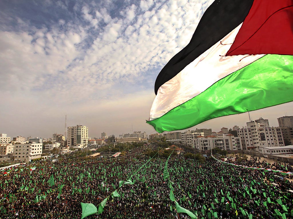 Tens of thousands of Hamas supporters jam Khatiba Square in Gaza City yesterday