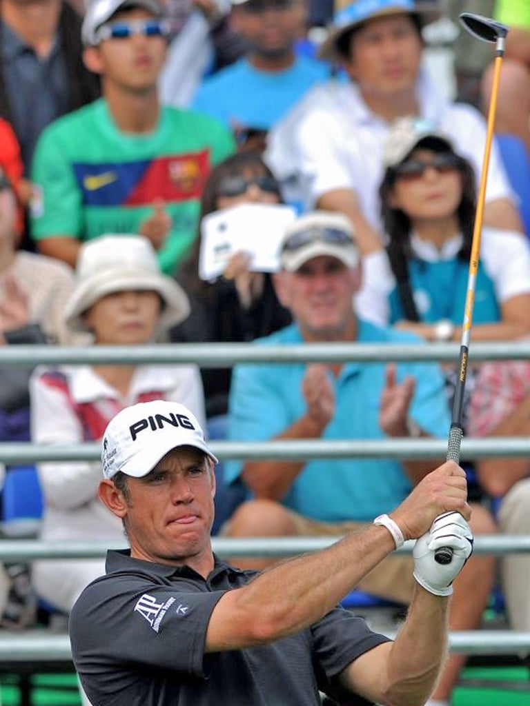 Lee Westwood tees off