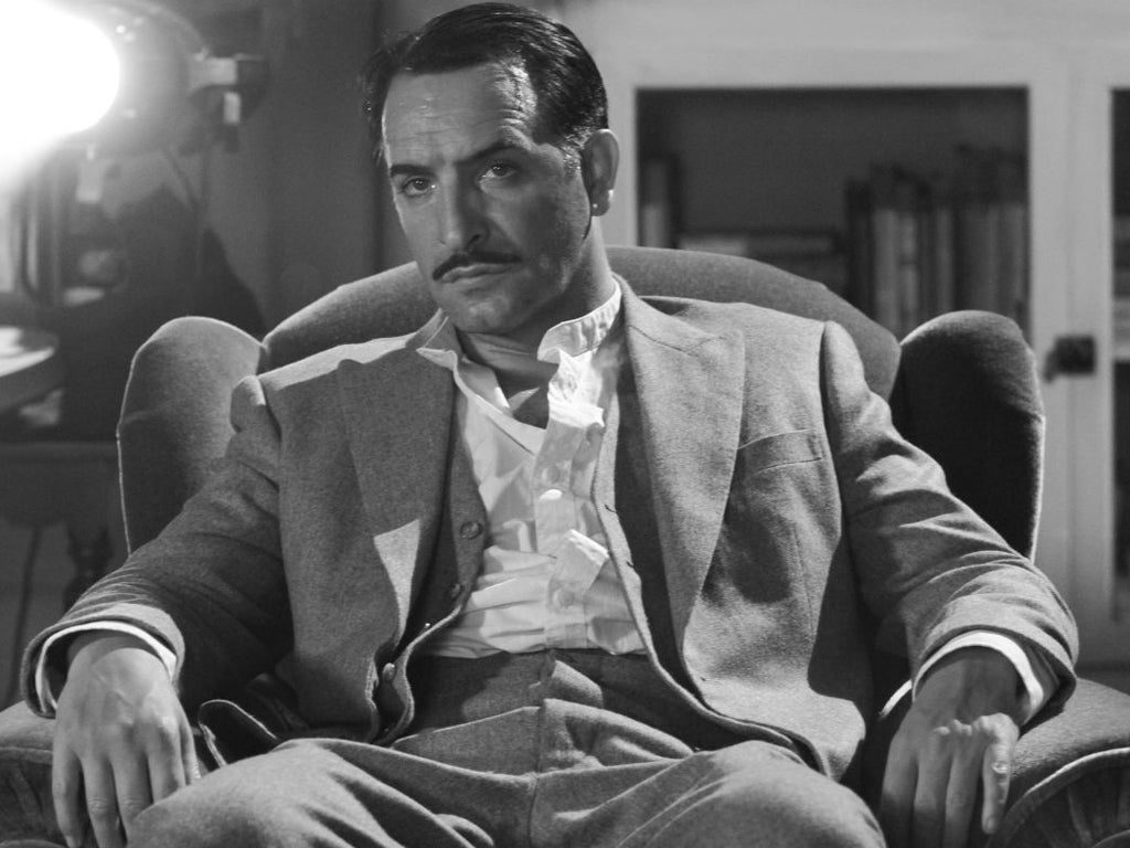 Jean Dujardin portrays George Valentin in The Artist