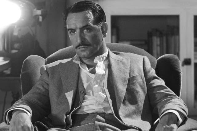 <p>Jean Dujardin portrays George Valentin in The Artist</p>