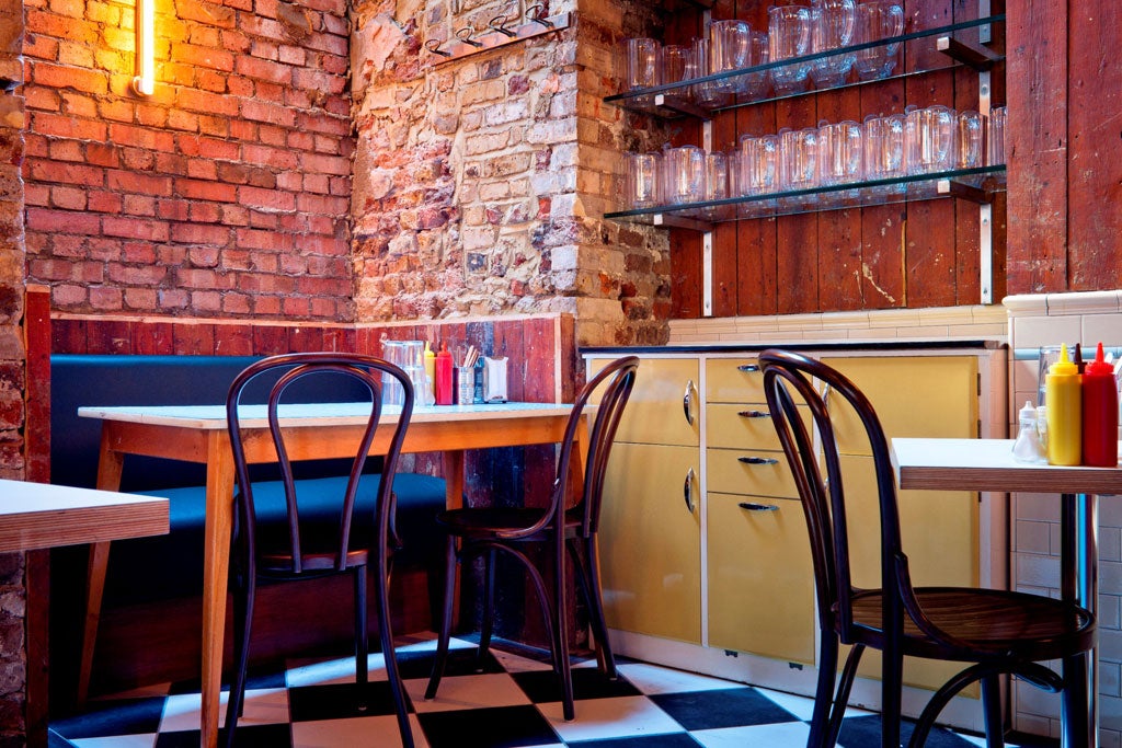 Mishkin's is a cool, shabby-chic mix of reclaimed wood and scrubbed brick