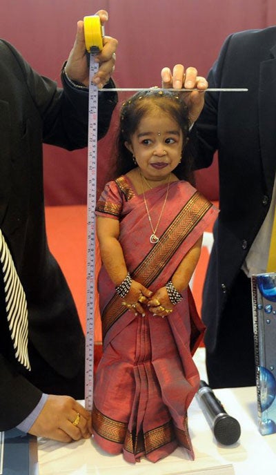 Guinness representatives today measured Jyoti Amge at 62.8 centimetres