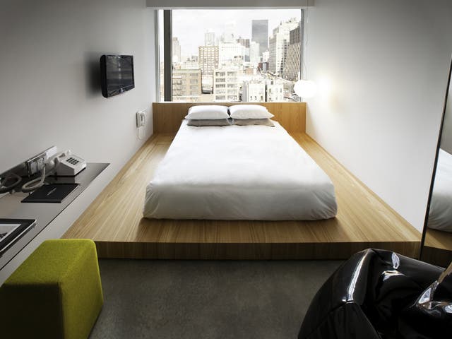 <p>Clean and serene: Platform beds</p><p>were inspired by Japanese ryokans, while</p><p>iPads add a hi-tech touch</p>