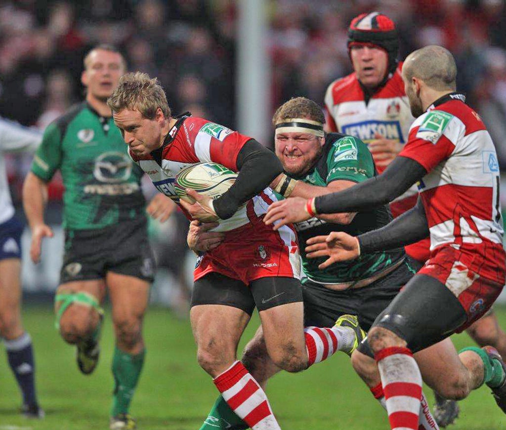 Cherry-and-white on top: Try-scorer Tim Taylor tests the Connacht defence