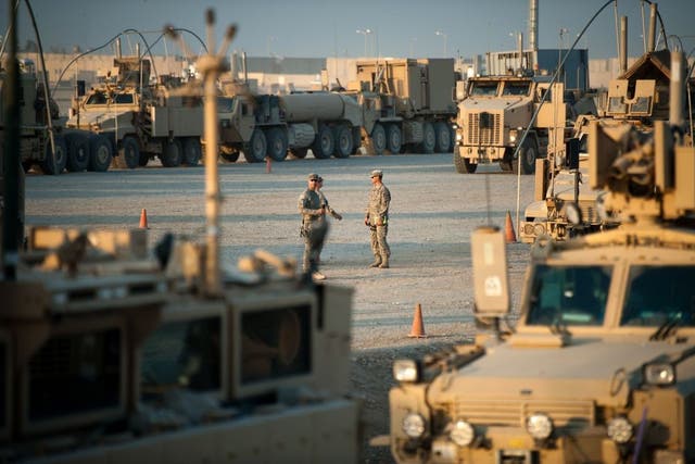 <p>Soldiers prepare the last convoy carrying US troops at Camp Adder on the outskirts of Nasiriyah, marking the withdrawal of US troops from Iraq</p>