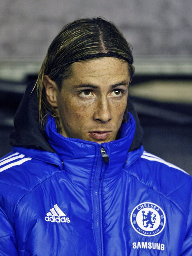 Poor old Fernando Torres is forced to warm the bench yet again at Wigan