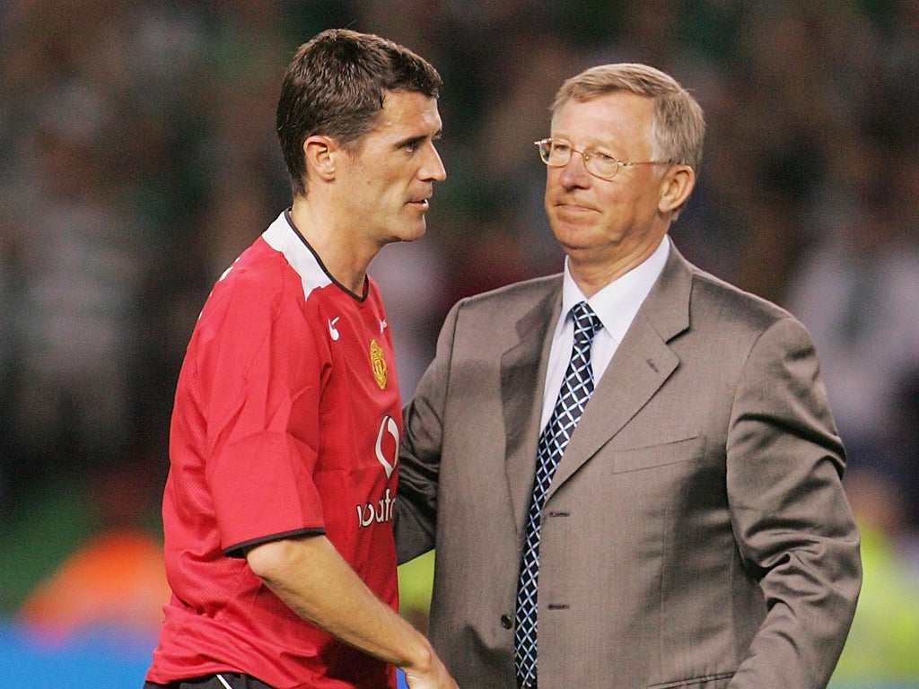 Manchester United player Roy Keane (left) and Manager Sir Alex Ferguson