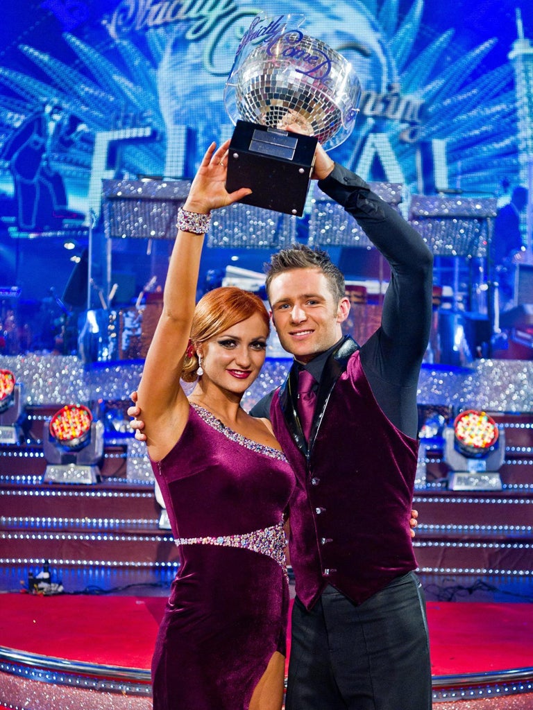 Aliona Vilani and Harry Judd celebrate with the winning trophy on Strictly Come Dancing,after their performances impressed viewers