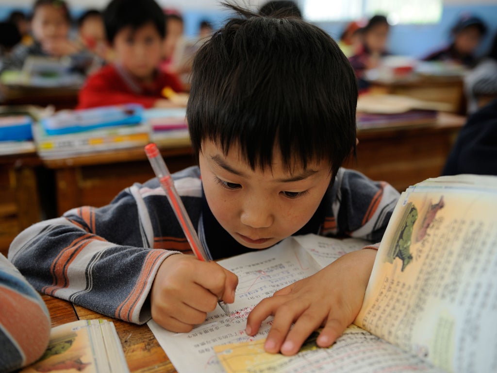A pupil at a school in Guangxi, China