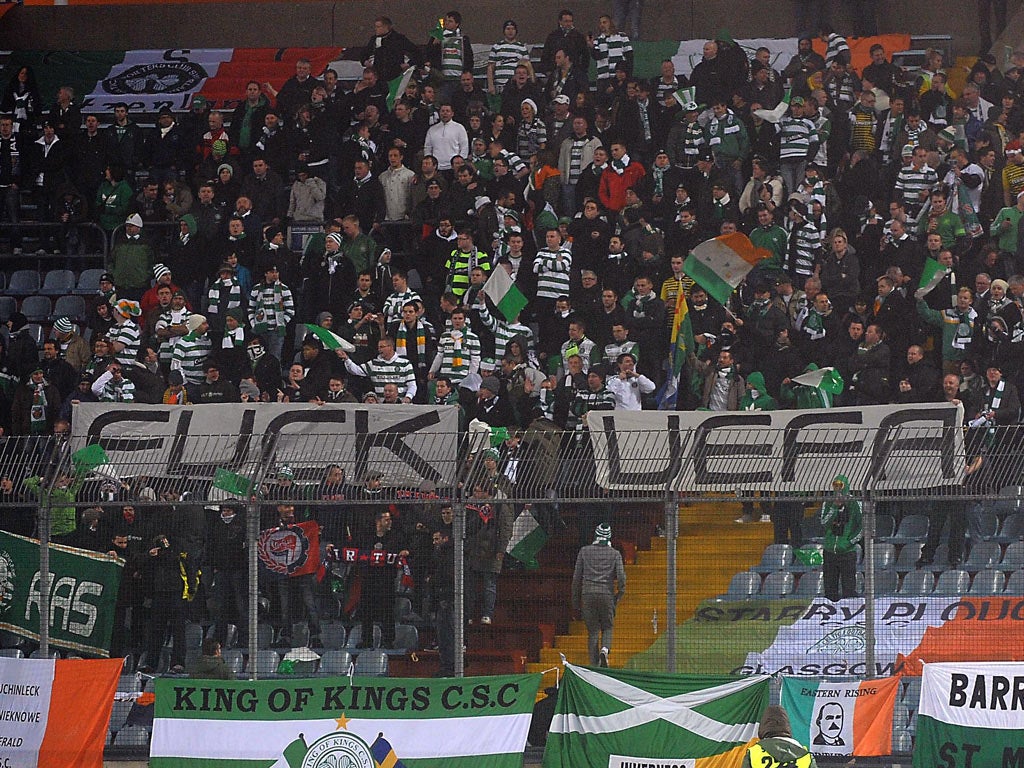 <p>The offending banner unfurled by Celtic fans</p>