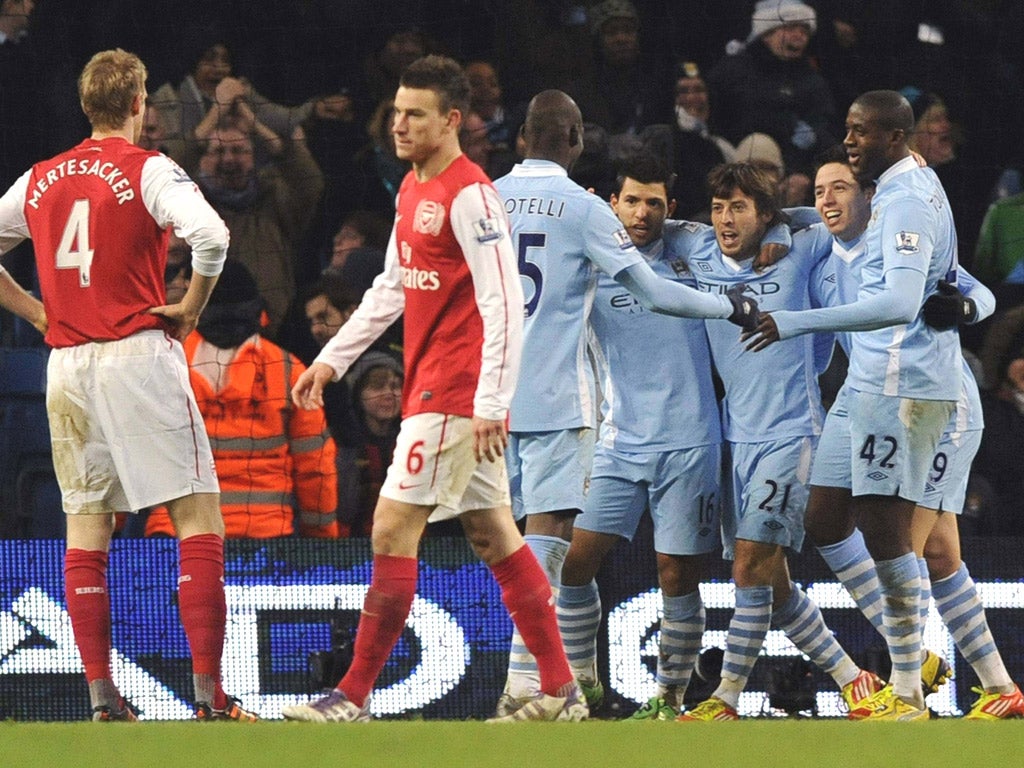 David Silva (third right) is congratulated on his winner against Arsenal on Sunday