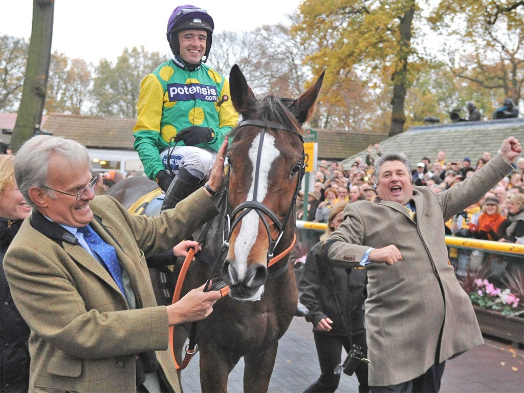 Kauto Star returns with rider Ruby Walsh, owner Clive Smith and trainer Paul Nicholls (right) after winning the Betfair Chase at Haydock last month