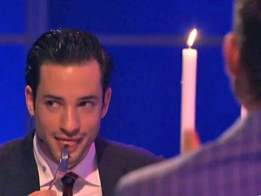 The presenters dressed in suits and sat on a candlelit set for the human meal