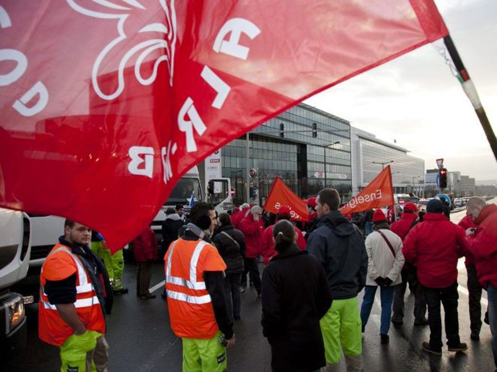 Trade union members block the road into Brussels at 'Delta', during a 24 hour general strike in the public sector