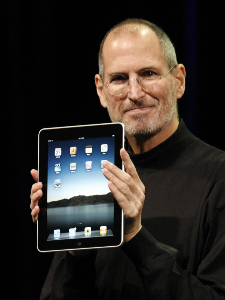 Game-changer: The late Apple boss Steve Jobs with the iPad