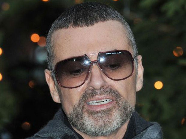 George Michael has returned home to the UK after leaving hospital in Vienna