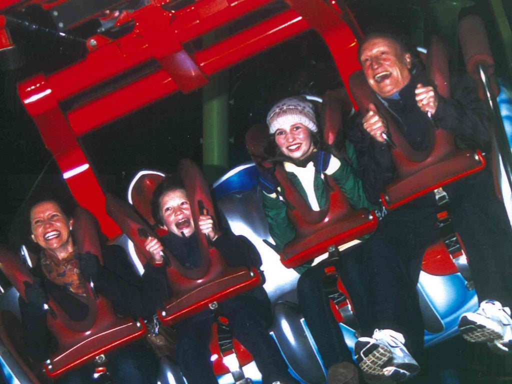 The Warnock family grin and bear it as we 'enjoy' the rides at the Winter Wonderland on Thursday