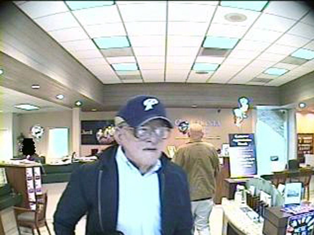 The Geezer Bandit during a robbery on a bank in California in April
last year