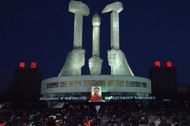 North Koreans mourn the dictator at a monument in Pyongyang
