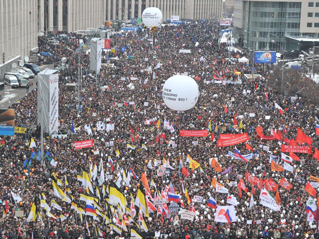 An estimated 100,000 people joined the rally in Moscow to
demand democratic reforms