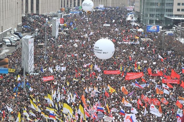 An estimated 100,000 people joined the rally in Moscow to
demand democratic reforms