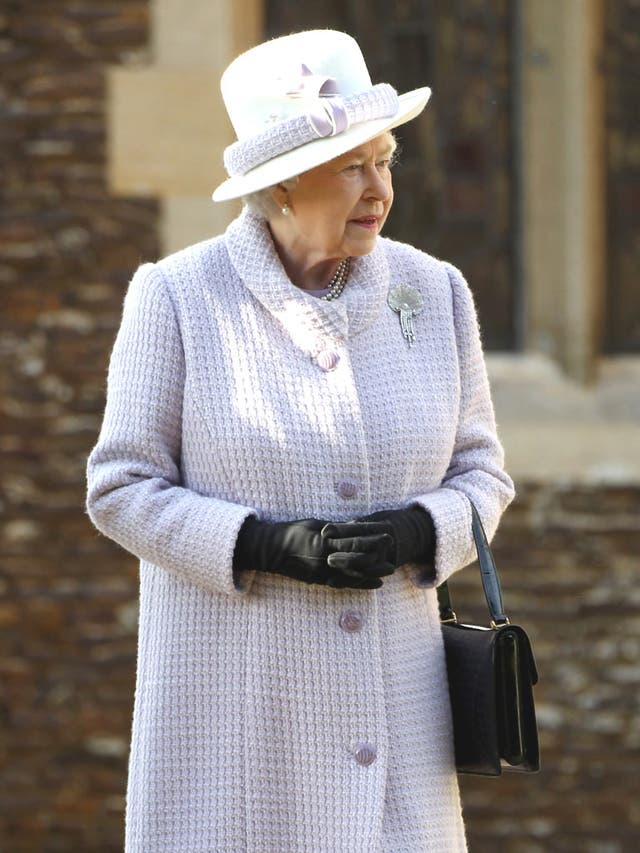 The Queen leaves the Christmas service at Sandringham