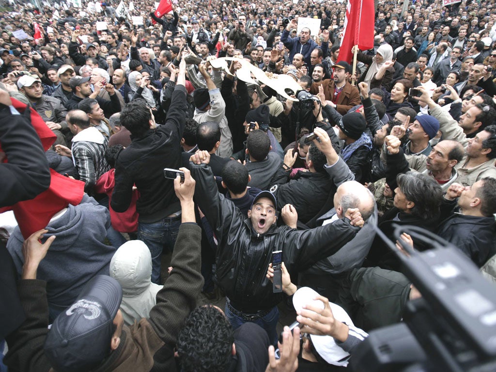 Protesters gather at the headquarters of Tunisia’s former
ruling party last January