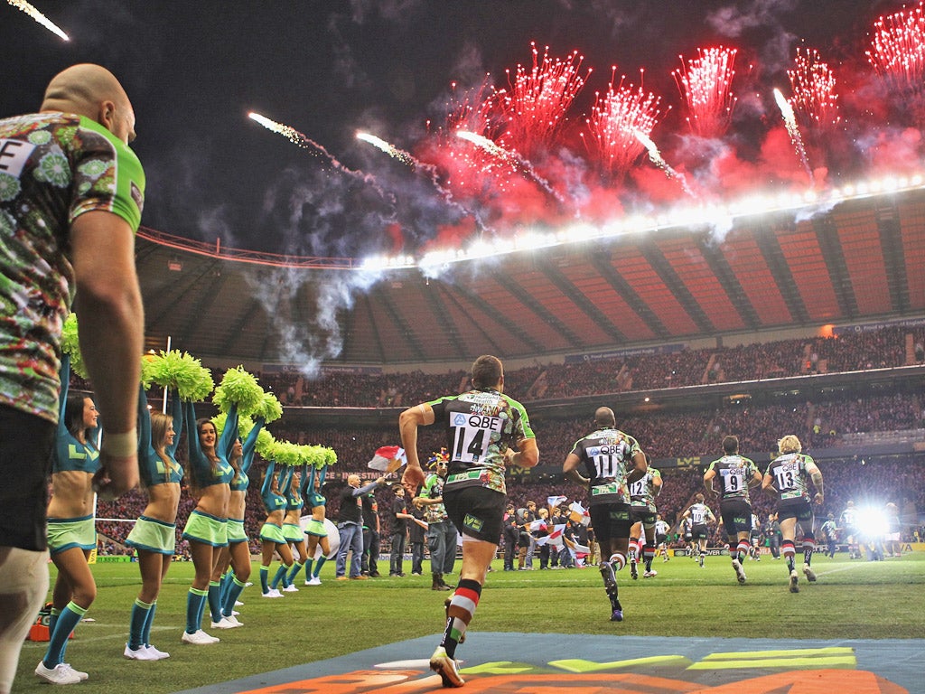 Fireworks and cheerleaders greet the players onto the Twickenham pitch