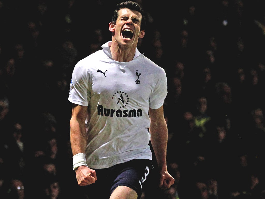 Gareth Bale celebrates his second - and sumptuous - goal against Norwich on Tuesday