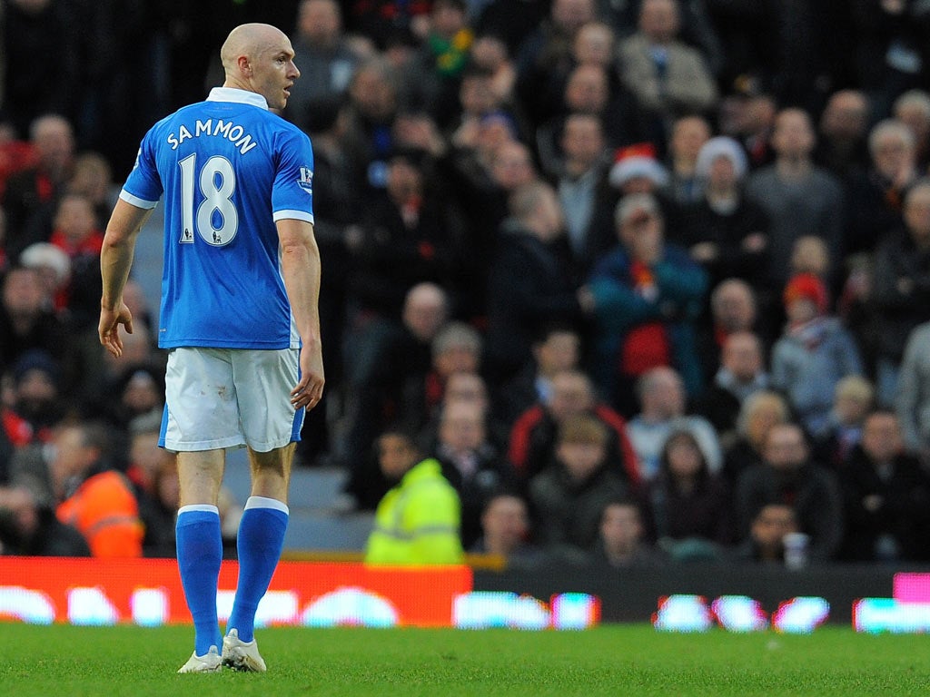 Conor Sammon leaves the pitch at Old Trafford