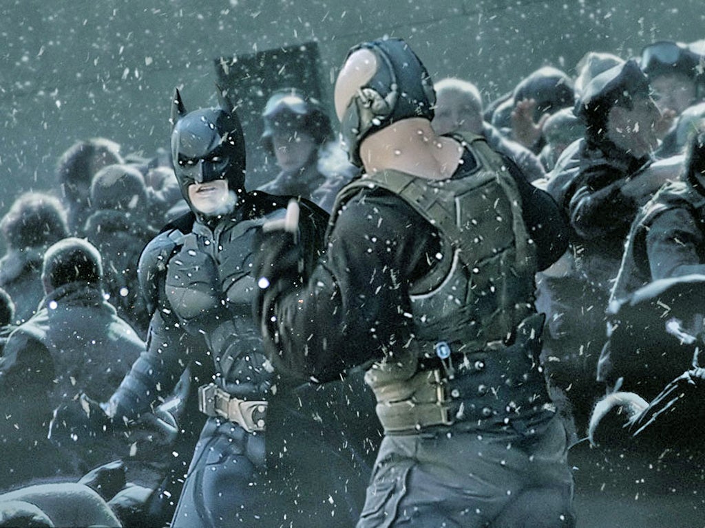Christian Bale as Batman and Tom Hardy as Bane in ‘The Dark Knight Rises’