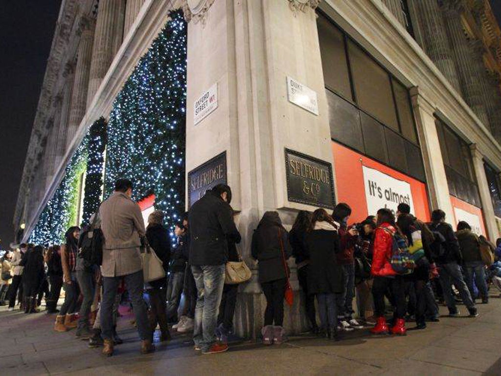 Bargain-hunters wait for Selfridges' sale to open on Boxing Day