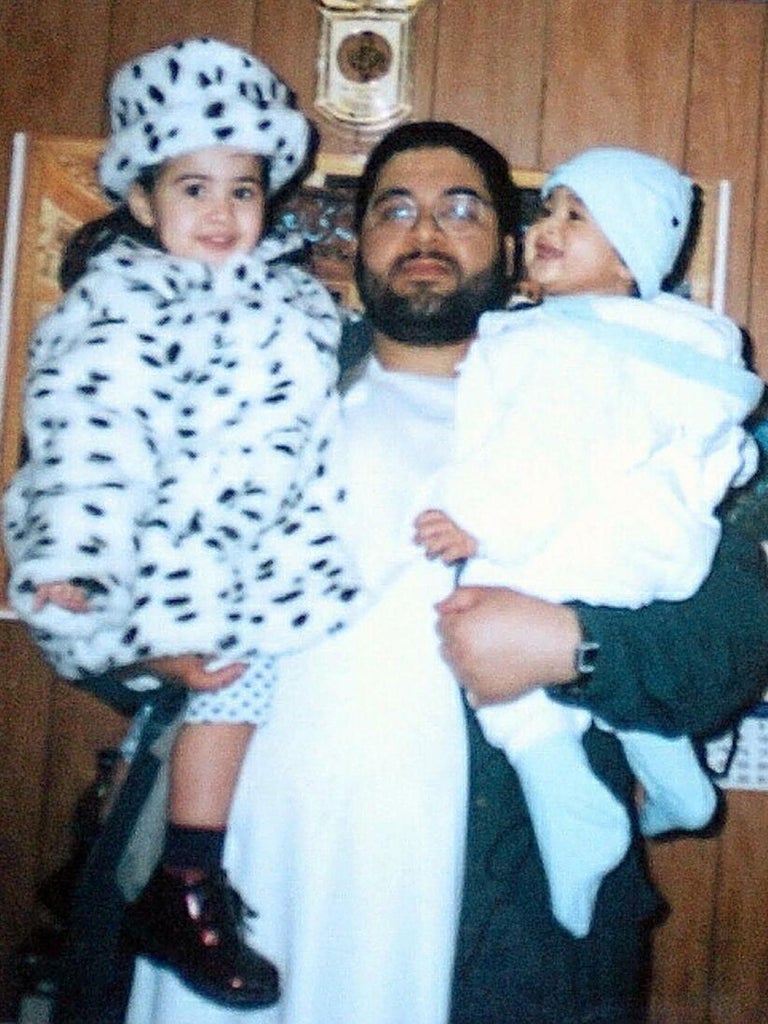 Shaker Aamer, with two of his four children, the youngest of whom he has never met