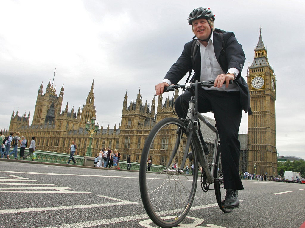 Boris Johnson leads the way at a no-expenses-spared
parade to mark the start of the London Olympics