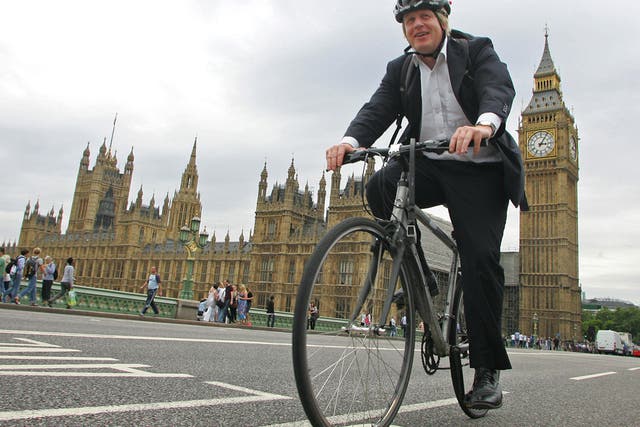 Boris Johnson leads the way at a no-expenses-spared
parade to mark the start of the London Olympics