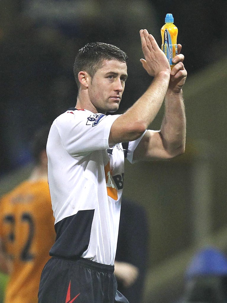 Gary Cahill looks like he is bidding farewell to the fans at the Reebok