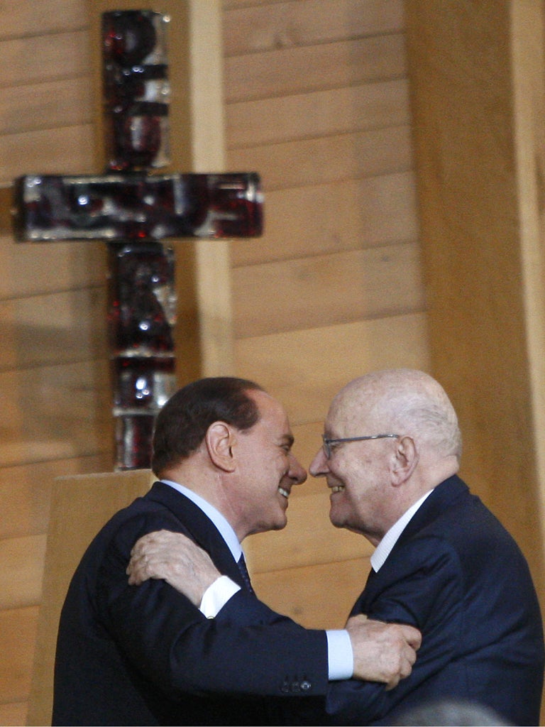 Silvio Berlusconi, left, was one of the many influential associates of Don Luigi Verze, right