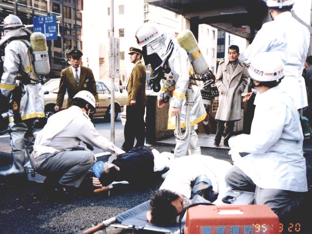 Japan’s emergency services treat commuters after the gas attack which saw the army decontaminate Tokyo’s subway cars