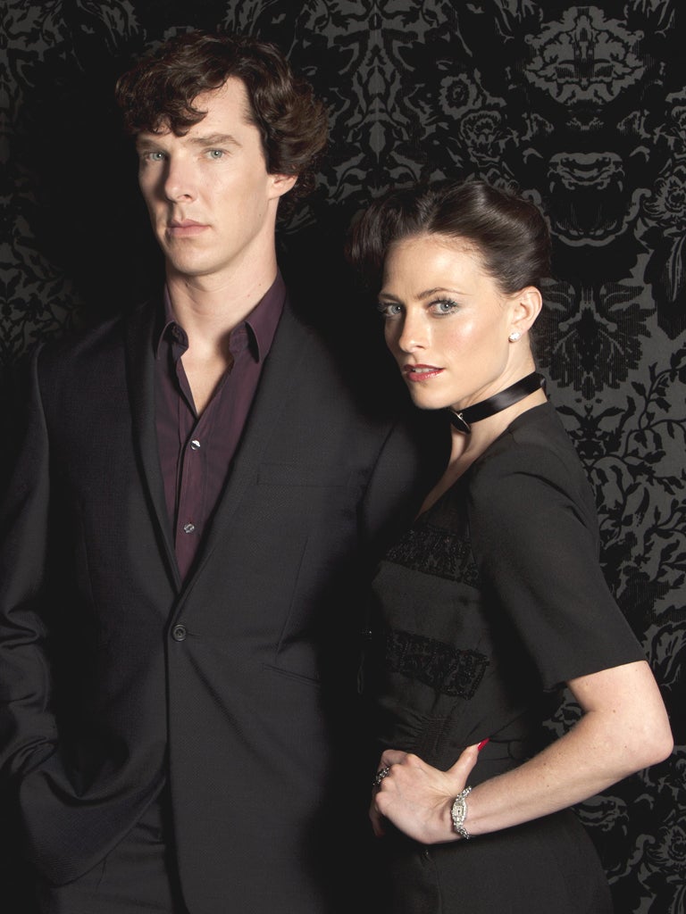 Benedict Cumberbatch as Holmes and Lara Pulver as Irene Adler
