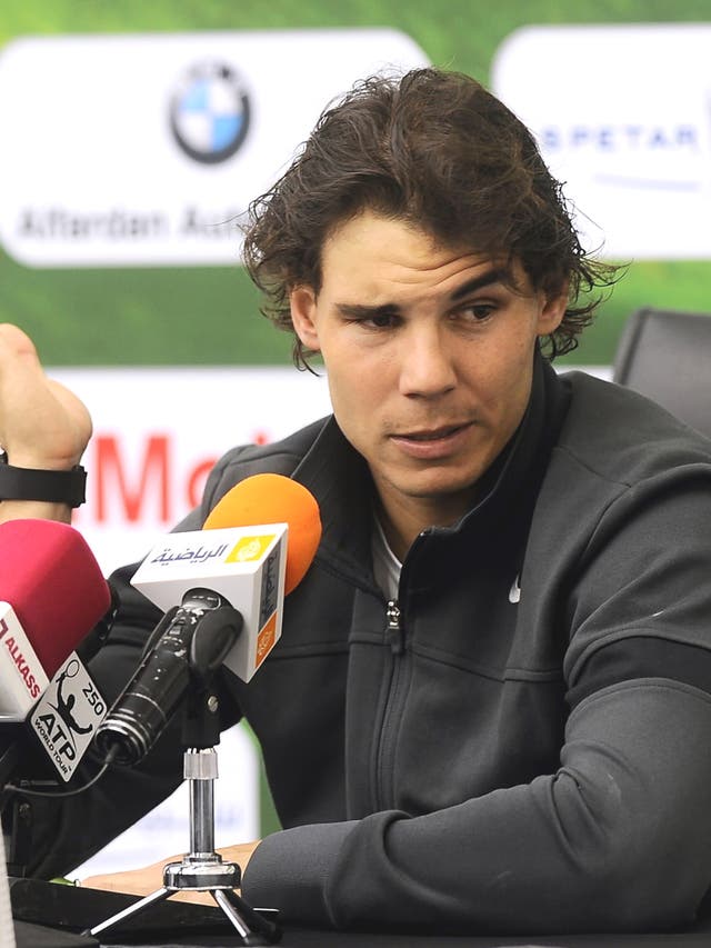Rafa Nadal is now using a heavier racket to try to increase his
power and improve his game this season