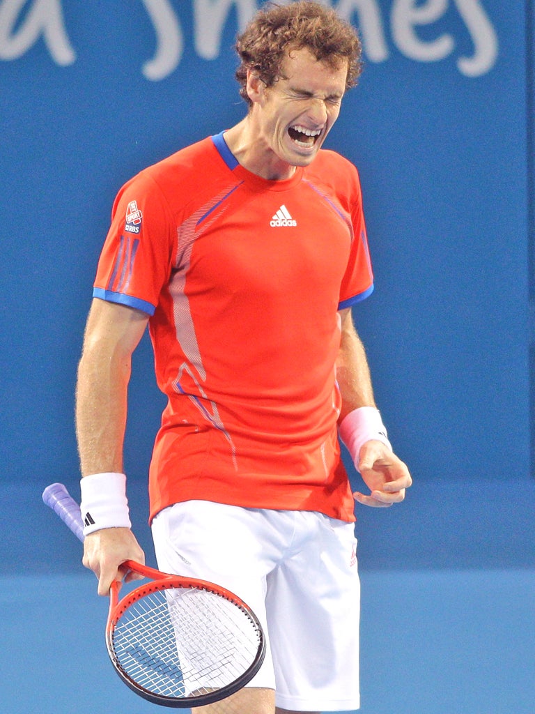 Andy Murray grimaces during his win over Mikhail Kukushkin