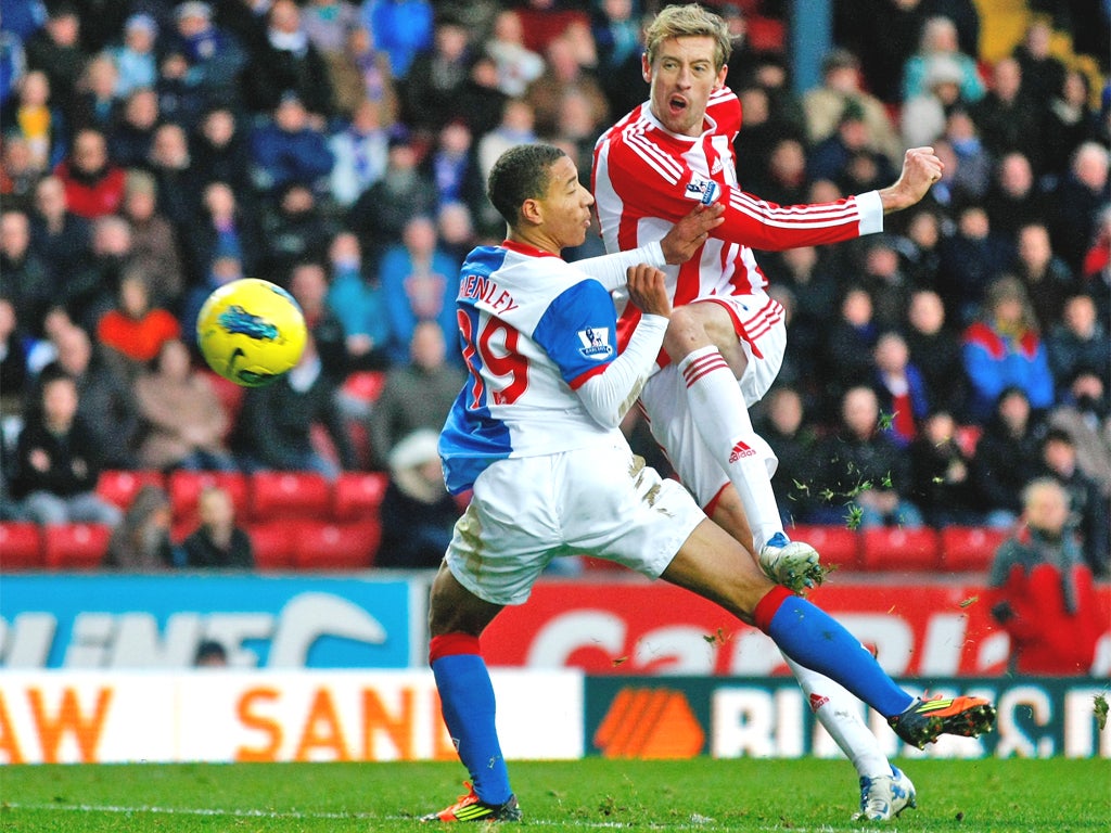 Stoke's Peter Crouch scores one of his two goals in the victory over Blackburn on Monday