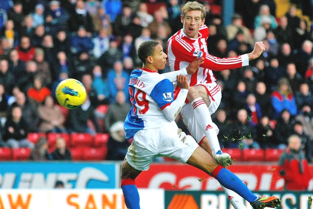 Stoke's Peter Crouch scores one of his two goals in the victory over Blackburn on Monday
