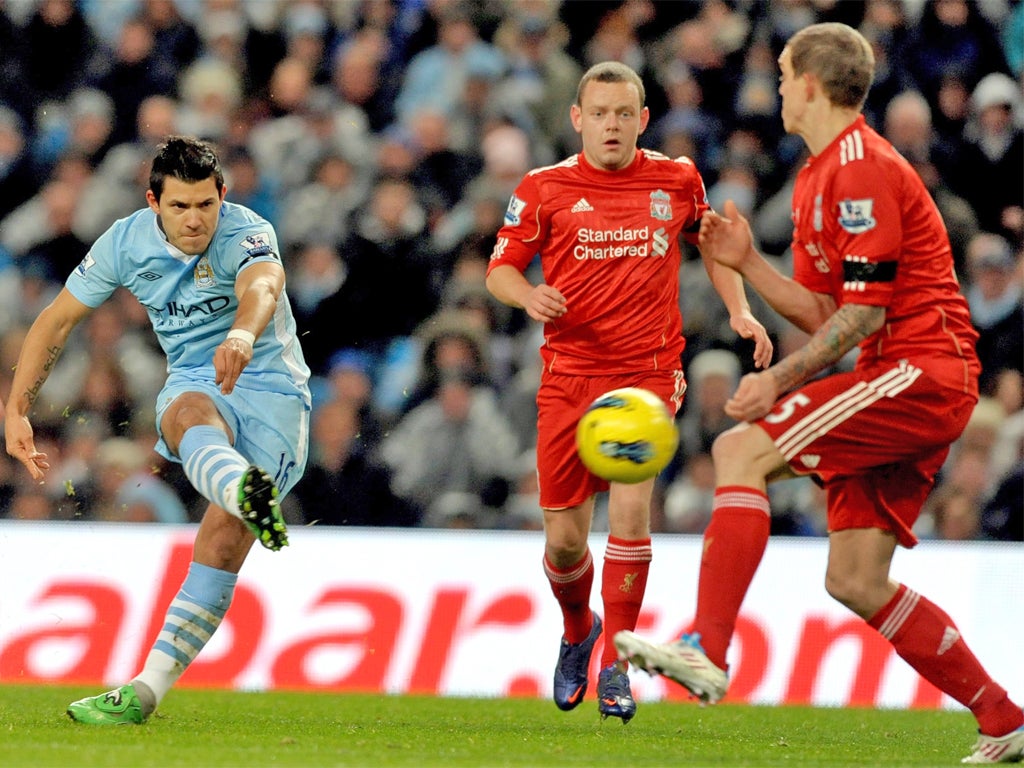 Manchester City's Sergio Aguero gives his side the lead last night