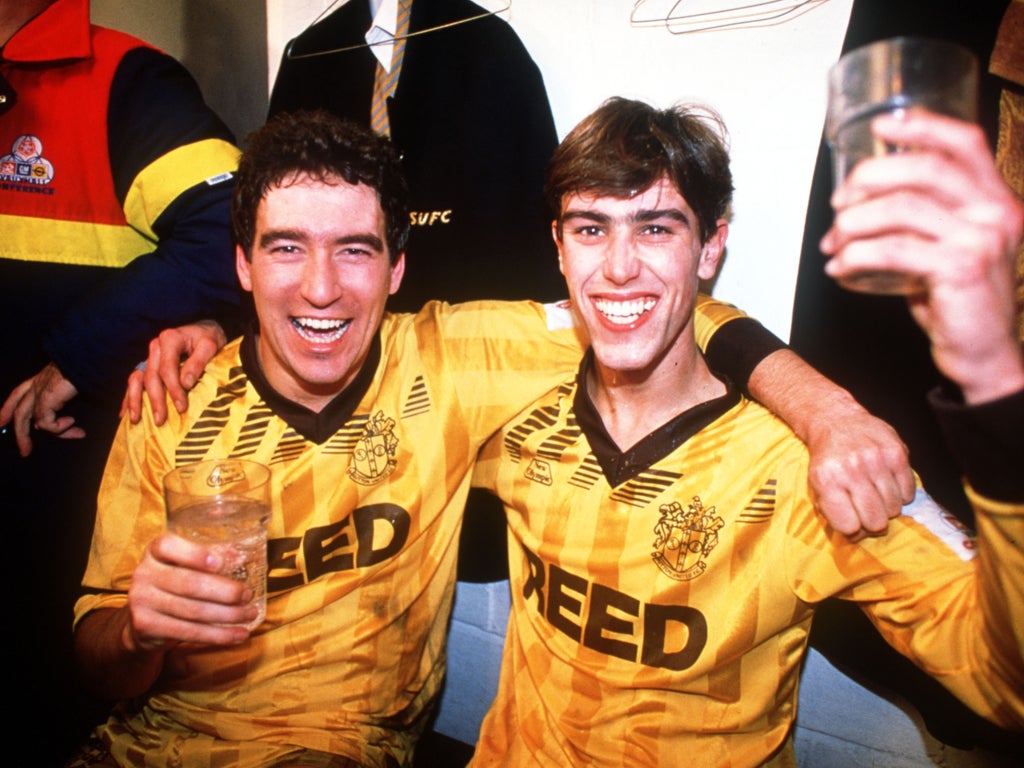Sutton's Tony Rains and Matt Hanlon celebrate their FA Cup victory over Coventry in 1989